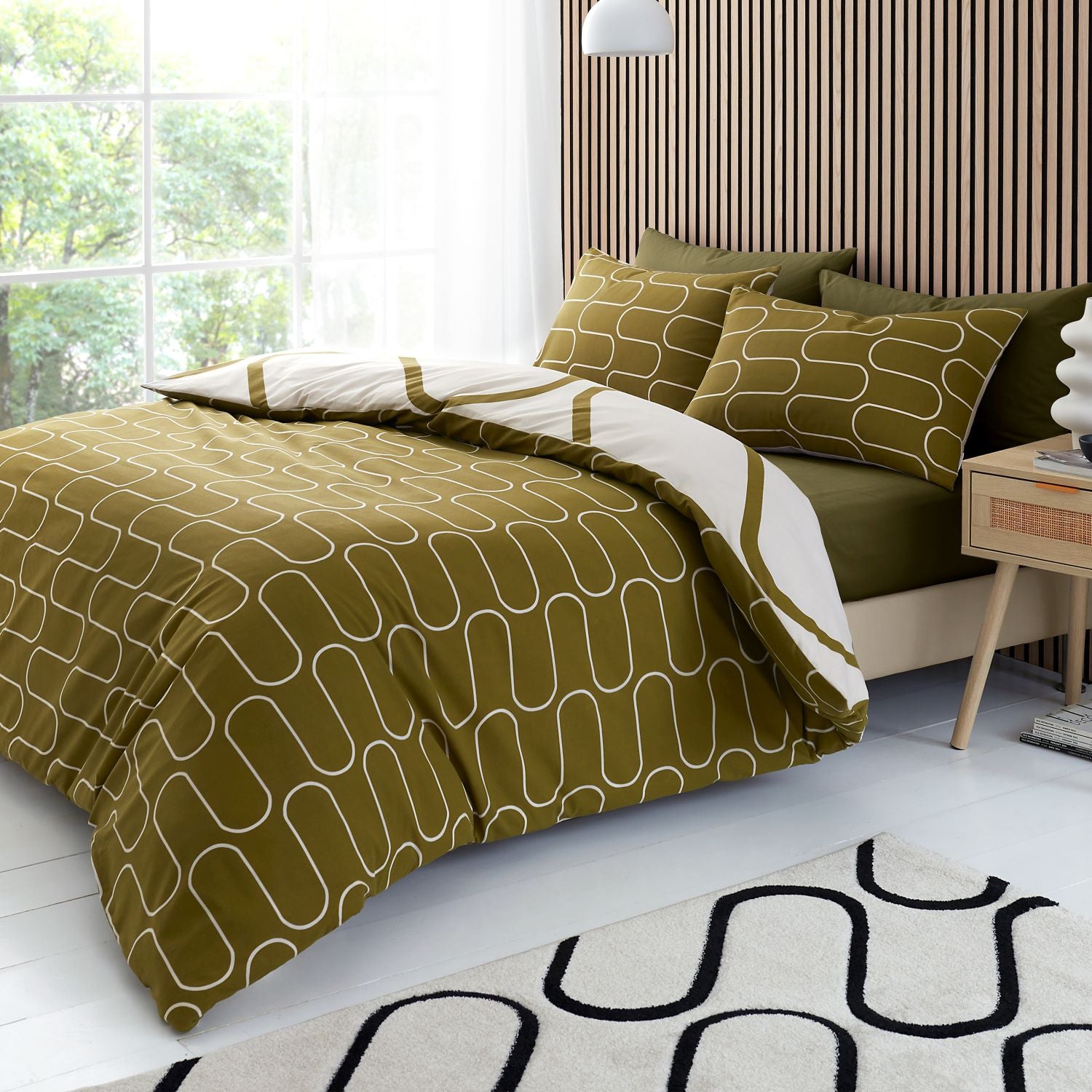 Tappeto da esterno verde con motivo geometrico 120 x 180 cm NAGPUR Tappeto da esterno verde con motivo geometrico 120 x 180 cm NAGPUR