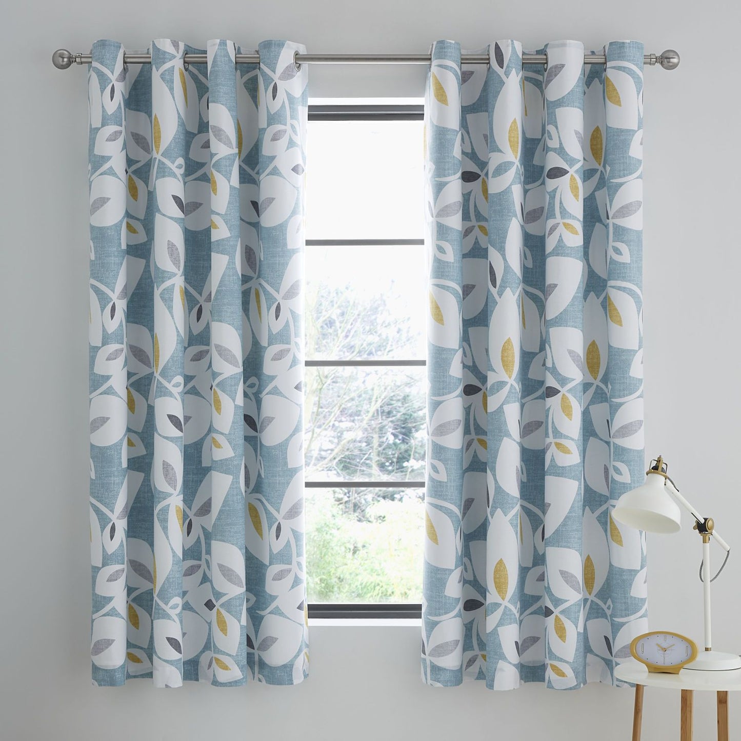 Catherine Lansfield Inga Leaf Teal Lined Eyelet Curtains