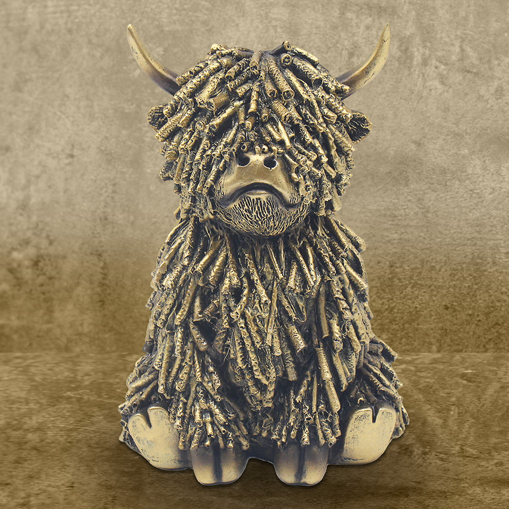 Sitting Gold Shaggy Highland Cow Ornament